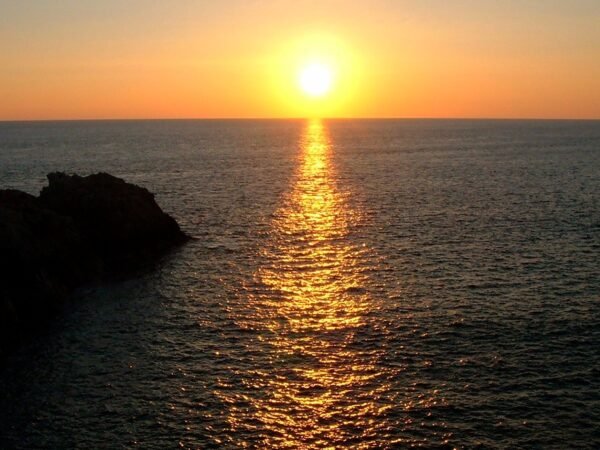 atardecer en punta cometa en huatulco rio adventure mexico