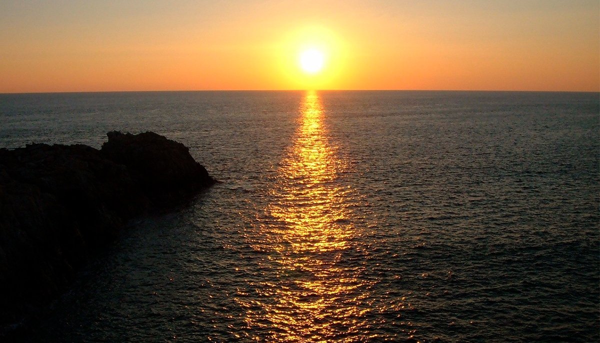atardecer en punta cometa en huatulco rio adventure mexico